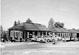 [Moving army huts into place (ca. 1946)]